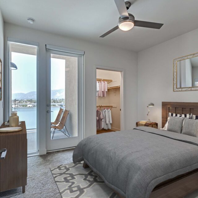 3-camden-glendale-apartments-glendale-ca-bedroom-with-floor-to-ceiling-window-and-patio-and-walk-in-closet-and-lighted-ceili.jpg_1